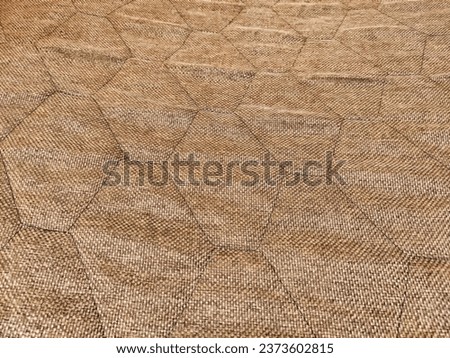 Rustic fabric factories matting, jute texture and background with honeycomb pattern. Abstract, frame, copy space, place for text Royalty-Free Stock Photo #2373602815