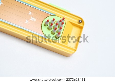Children's games, mini bowling, mini board games. Train patience and concentration concept game.Isolated white.