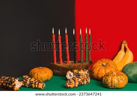 Kwanzaa, african holiday Kwanzaa with decoration of seven candles in red, black and green colors, vegetable harvest, corn. Greeting card banner. Happy Kwanzaa