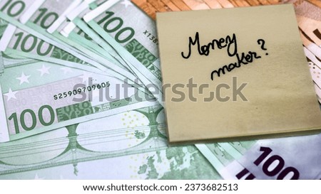 Sticky note on money. Text money maker? on post it. Bucharest, Romania, 2020