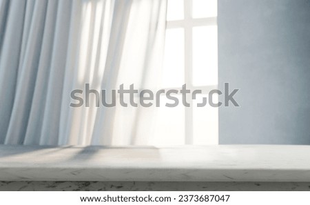 Empty marble desk in front of window light and white curtains. Home interior with table countertop. Product placement display in luxury house. Royalty-Free Stock Photo #2373687047
