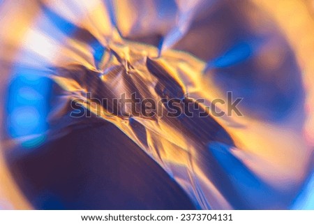 Colourful abstract with tones of orange and blue.