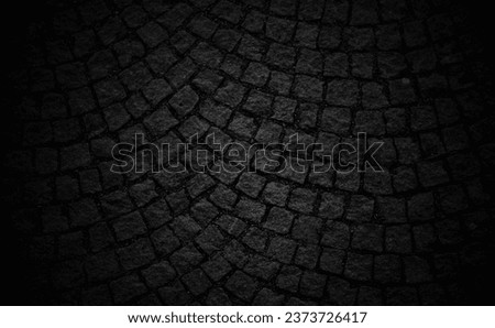 A Texture of a Grungy Black Concrete Wall as a background is a digital representation of a weathered and aged concrete surface, typically in dark or black tones. 
