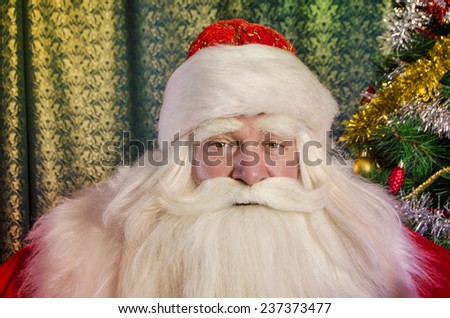 Santa Claus sitting in a beautiful interior