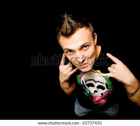 Picture of rocker man in t-shirt over black
