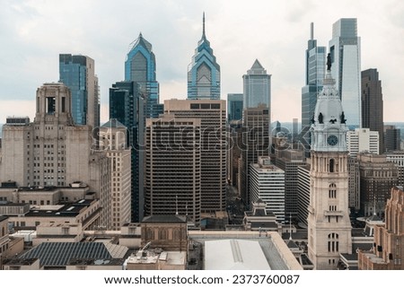 Aerial panoramic cityscape of Philadelphia financial downtown, Pennsylvania, USA. Philadelphia City Hall Clock Tower. A vibrant business and cultural neighborhoods.