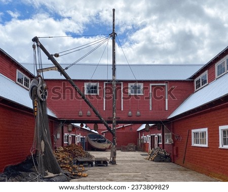 Icy Strait Point, Alaska:  The Hoonah Packing Company facility a former fish cannery, now converted into a museum, restaurant, and shops. Privately owned tourist and cruise destination.  Royalty-Free Stock Photo #2373809829