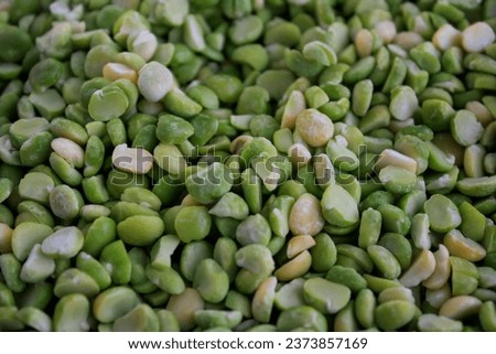 close up of green dry split pea Royalty-Free Stock Photo #2373857169