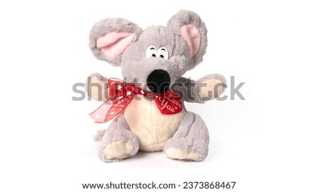 Fluffy grey toy mouse isolated on white background. High quality photo