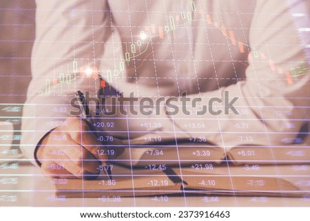 Financial trading chart multi exposure with man desktop background. Concept of success.