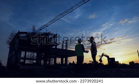 Engineer Teamwork Concept,Worker team join hands together in construction site.	