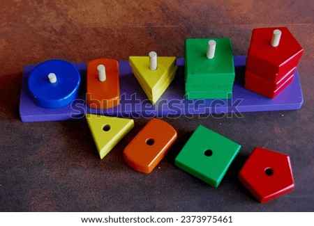 Wooden Stacking Shape Puzzle
Wonderhood Wooden Shape Sorter Stacking Montessori Toy for 2+ Years Old Kids - Geometric Shapes  Color Sorting, Brain Development Games, Educational Gifts Royalty-Free Stock Photo #2373975461
