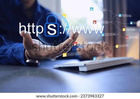Website developer holding security https www domain type for secure to increase security level. Encrypted communication protocol using Asymmetric Algorithm. Royalty-Free Stock Photo #2373983327