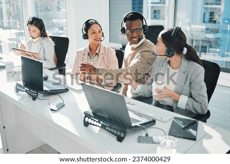 Call center, staff group and talk at help desk with laptop, telemarketing or voip tech with problem solving. Women, man and customer service agent for contact us, technical support or consulting team Royalty-Free Stock Photo #2374000429