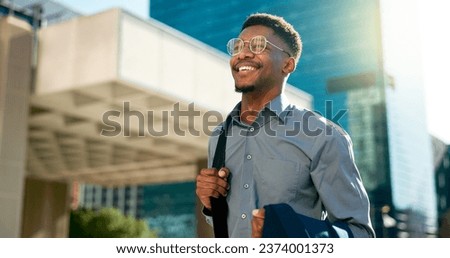 Business, happy and walking black man on city journey, commute trip and realtor smile on way to office building. Happiness, career expert and African real estate agent on morning travel in Nigeria Royalty-Free Stock Photo #2374001373