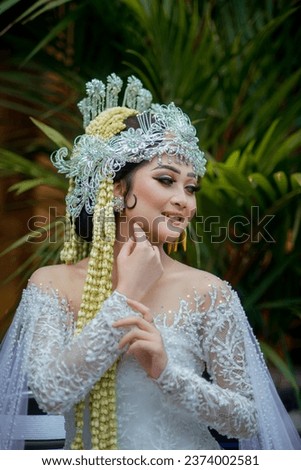 Amazing smiling bride. Traditional Javanese Bridal Portrait. Indonesian bride. Wedding day bride in wedding dress. Beautiful bride. Beautiful model. Javanese wedding dress. Akad Nikah Dress.