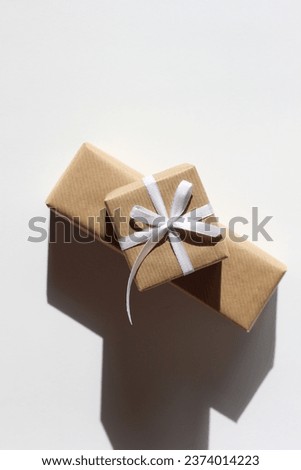 Christmas Presents. Holidays Gift Box Decorated with White Ribbon Bow. Holidays Celebration Concept.