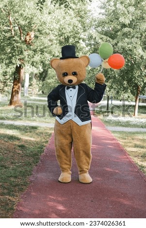 Teddy Bear Costume in park Royalty-Free Stock Photo #2374026361