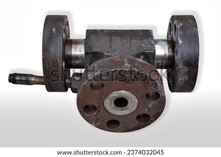 A T-fitting for high pressure technology. It is made from a solid metal block and equipped with threaded flanges. Nominal pressure 3600 bar. There is also one 	reduced shaft bolt visible. Royalty-Free Stock Photo #2374032045