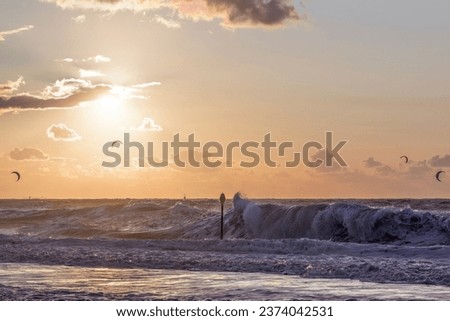 Majestic view with sunset on the ocean during a stormy weather