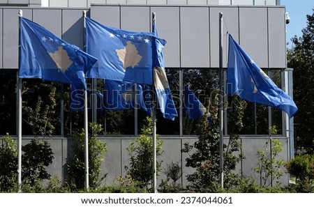 Kosovo national flags at the building of the Government of The Republic of Kosovo Royalty-Free Stock Photo #2374044061