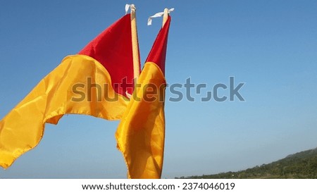 Semaphore flag for Scout in Indonesia or bendera semaphore pramuka indonesia with blue sky backgrounf