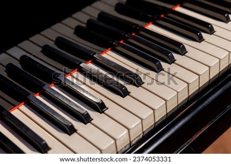 Background of old piano keyboard. Close up