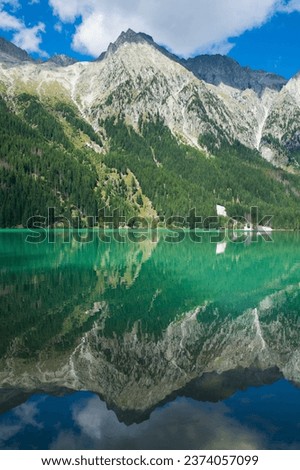 Wonderful landscape with peaceful alpine lake in Trentino Alto-Adige, Italy Royalty-Free Stock Photo #2374057099