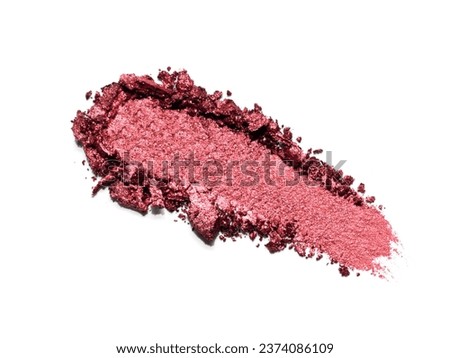 Red shimmering eye shadow texture swipe isolated on white background. Cosmetic product brush swatch Royalty-Free Stock Photo #2374086109