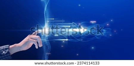 Businessman touching a polygon with bright lights and an arrow pointing forward. Finance capital investment economic growth. Digital technology in the era of change.