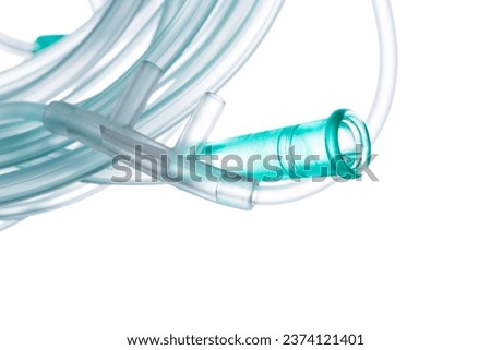 Oxygen tubing hose with onnector and silicone fitting, component for controlled delivery of medical-grade oxygen, closeup isolated on white background Royalty-Free Stock Photo #2374121401