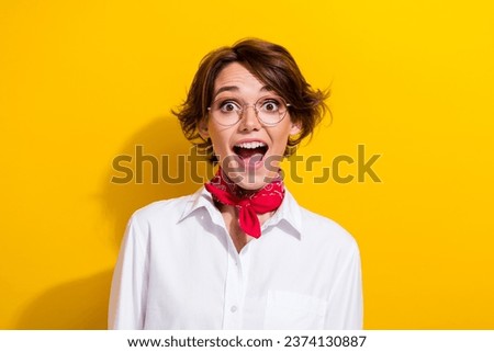 Photo of astonished young attractive woman brown hair open mouth screaming discount for students advert isolated on yellow color background Royalty-Free Stock Photo #2374130887
