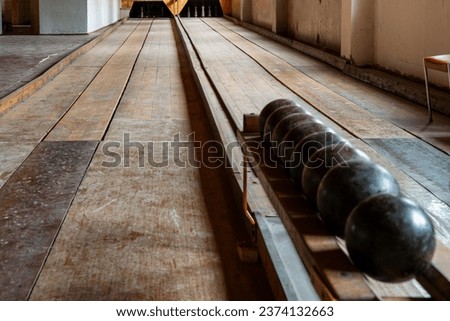 Detailed view of a historical bowling alley.