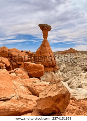 Toadstool Hoodoo, Natural Red Rock Formation, Along The Toadstools Hike in Grand Staircase-Escalante National Monument in Utah. Royalty-Free Stock Photo #2374151959