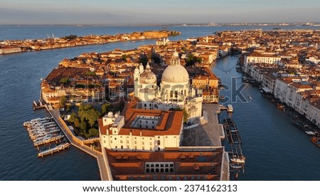 Venice from above, Grand Canal, Basilica di Santa Maria della Salute, and Punta della Dogana, triangular shape architecture, sunrise, Italy Royalty-Free Stock Photo #2374162313