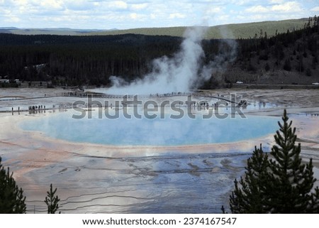 geyser lakes with blue water and steam