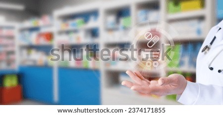 Concepts of online trade in medicines. Hand shows shopping cart at pharmacy.