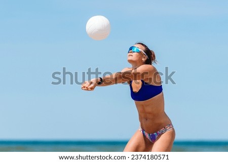 Professional player woman playing volleyball on the beach. Horizontal sport theme poster, greeting cards, headers, website and app