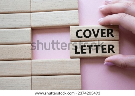 Cover Letter symbol. Concept word Cover Letter on wooden blocks. Businessman hand. Beautiful pink background. Business and Cover Letter concept. Copy space