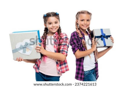present box from shopping. children girls with boxes. happy birthday. birthday present box. children girls sharing present. present to friend. happy holiday