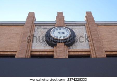Ant's-Eye View of a clock on top of a building. Picture for use in illustrations Background image or copy space