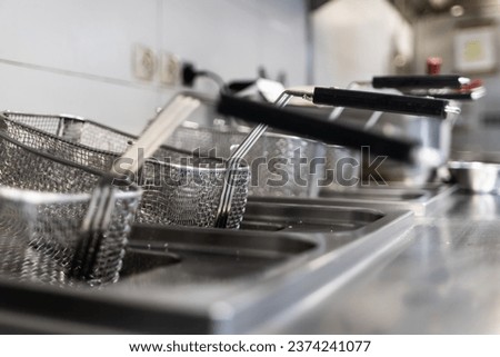 Picture of metal grids for frying food in boiling oil