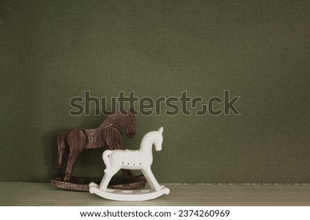 Decorative toy horses on the shelf