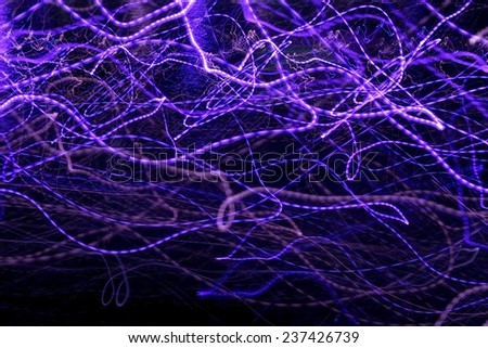 Background of twisty fluorescent lines