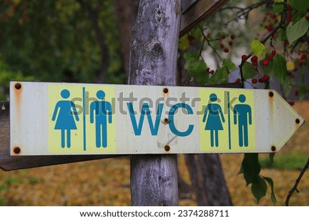 men's and women's restroom sign
