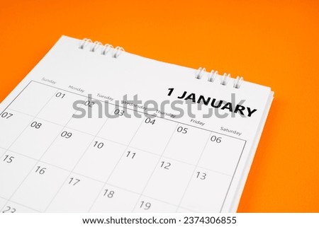 January 2024 month calendar on orange color cover background. Monthly calendar concepts. Royalty-Free Stock Photo #2374306855