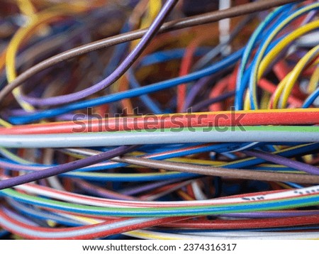 Close-up of confused mixed multi-colored wires
