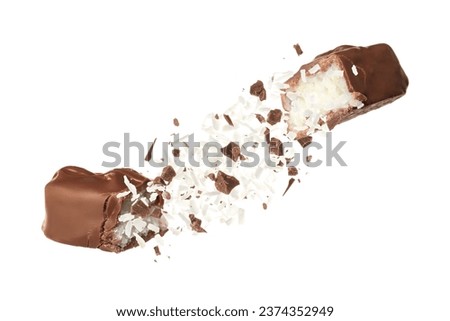 Broken chocolate bar with shredded coconut in air on white background Royalty-Free Stock Photo #2374352949