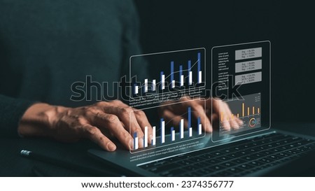 Analyst using computer for business and financial data and information analysis. KPI management in sale operation cost, marketing promotion campaign, account and financial report Royalty-Free Stock Photo #2374356777