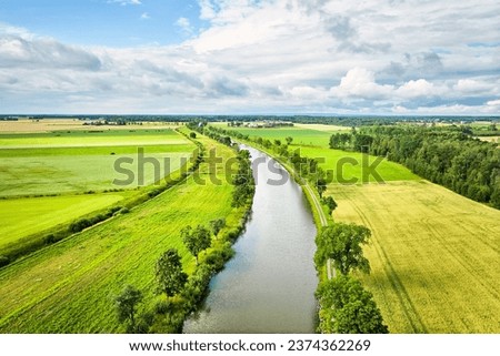 Countryside view of the canal Göta Kanal with the following hiking trail just outside Töreboda. Göta Kanal connects the Swedish west and east coasts and is a popular route during the summer by boat.